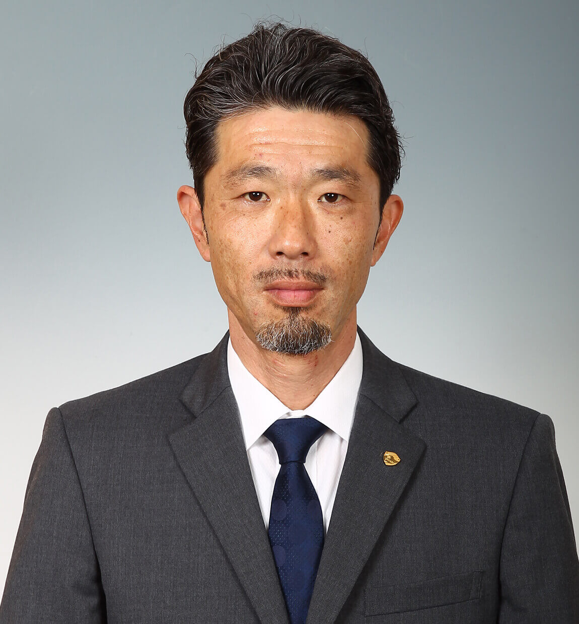 強化育成本部長 丹治 祥庸の写真を紹介