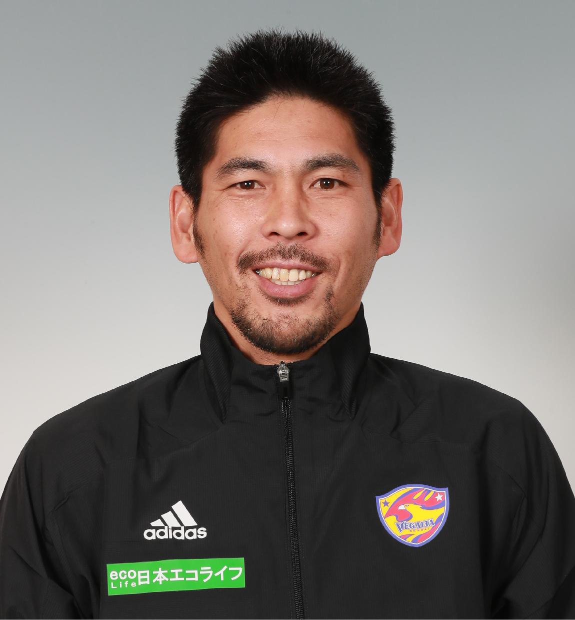 コーチ 村上 和弘の写真を紹介